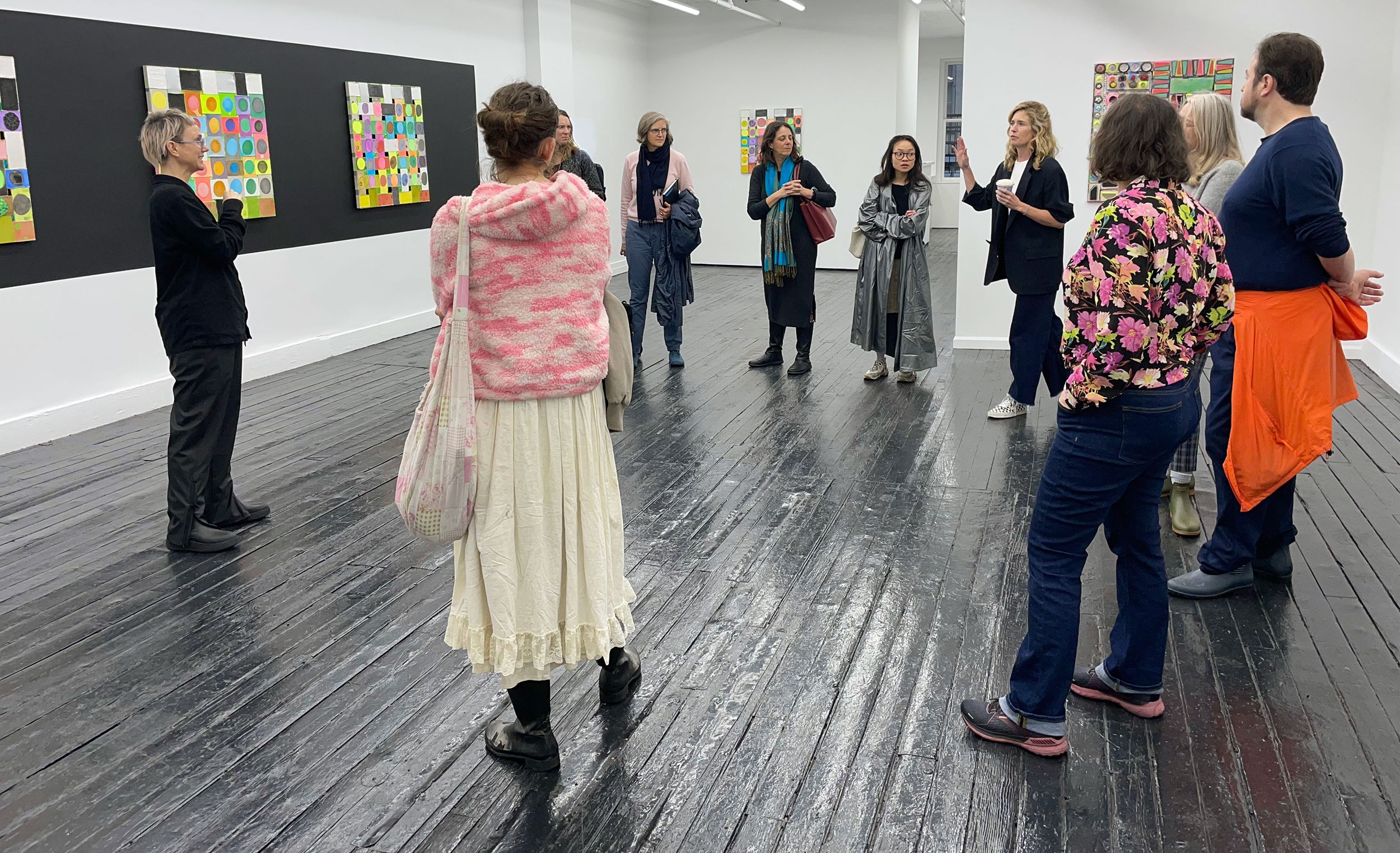 MFA students talking with gallery person in New York City