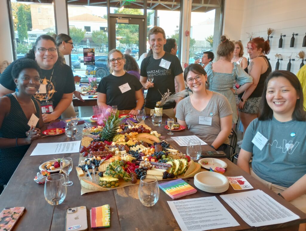 Guests, including Rigoria E. Tejada, Associate Director of Alumni & Friends Engagement (back left), and Emilee Cocuzzo '18, MBA '19, GOLD Council Co-Chair (bottom right)