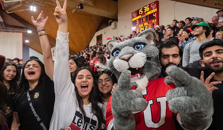 mascot with students