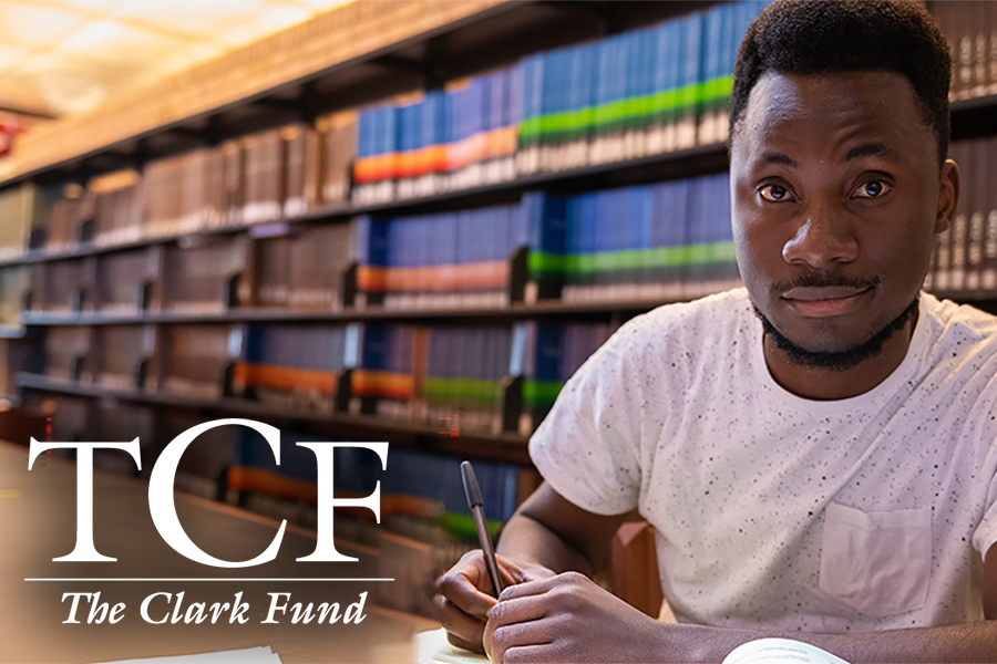 alumni student with TCF initials on screen