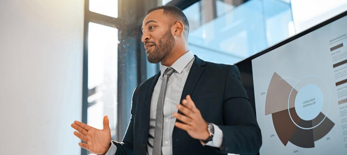 Young professional presenting during a business meeting