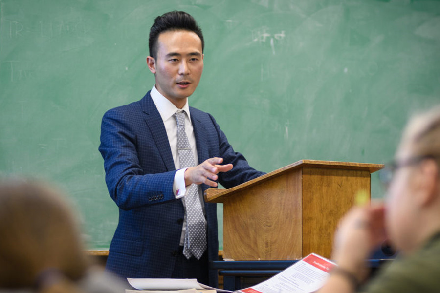 Asian Studies Professor in front of class