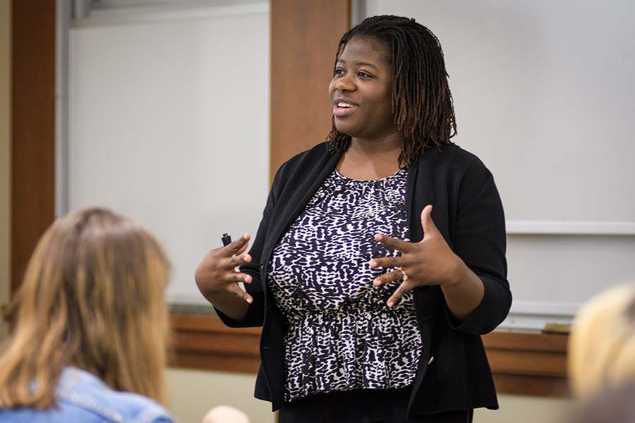 Nicole Overstreet speaking in a classroom
