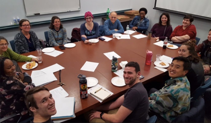 faculty sitting around table