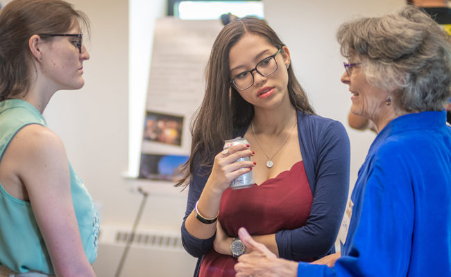 Professors talking at Hiatt event