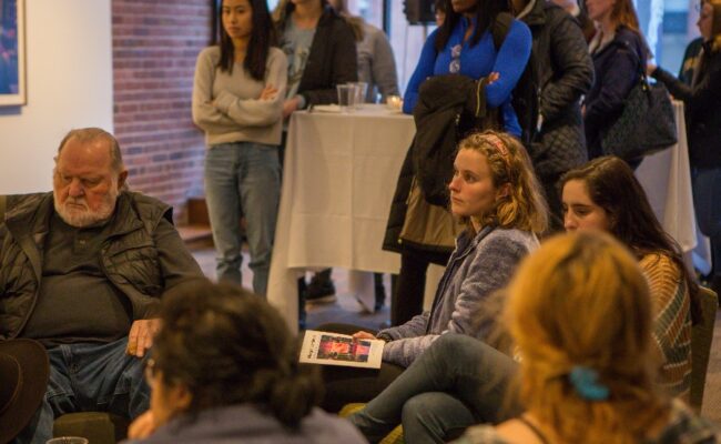 Audience listening to public ta