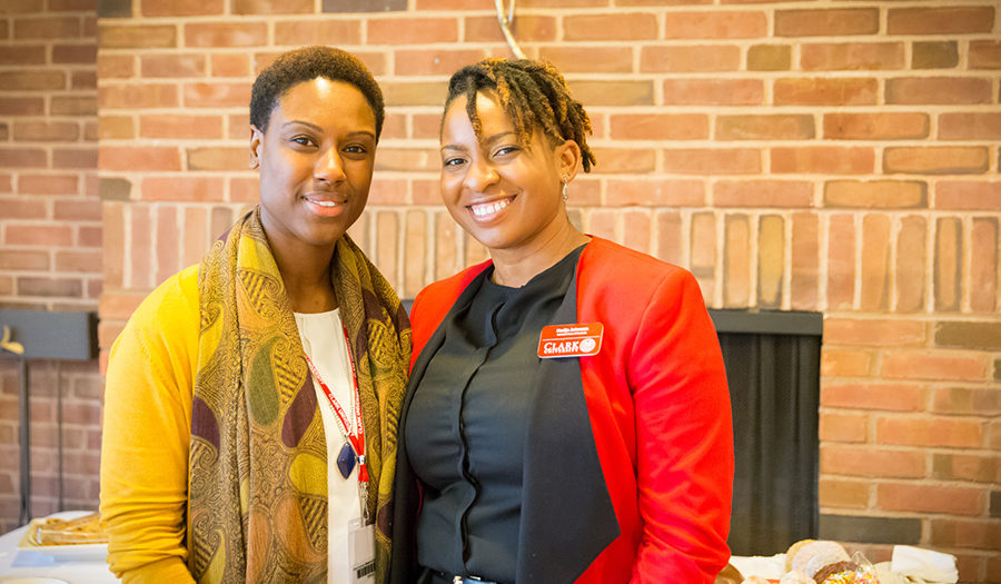 alumni member networking with student