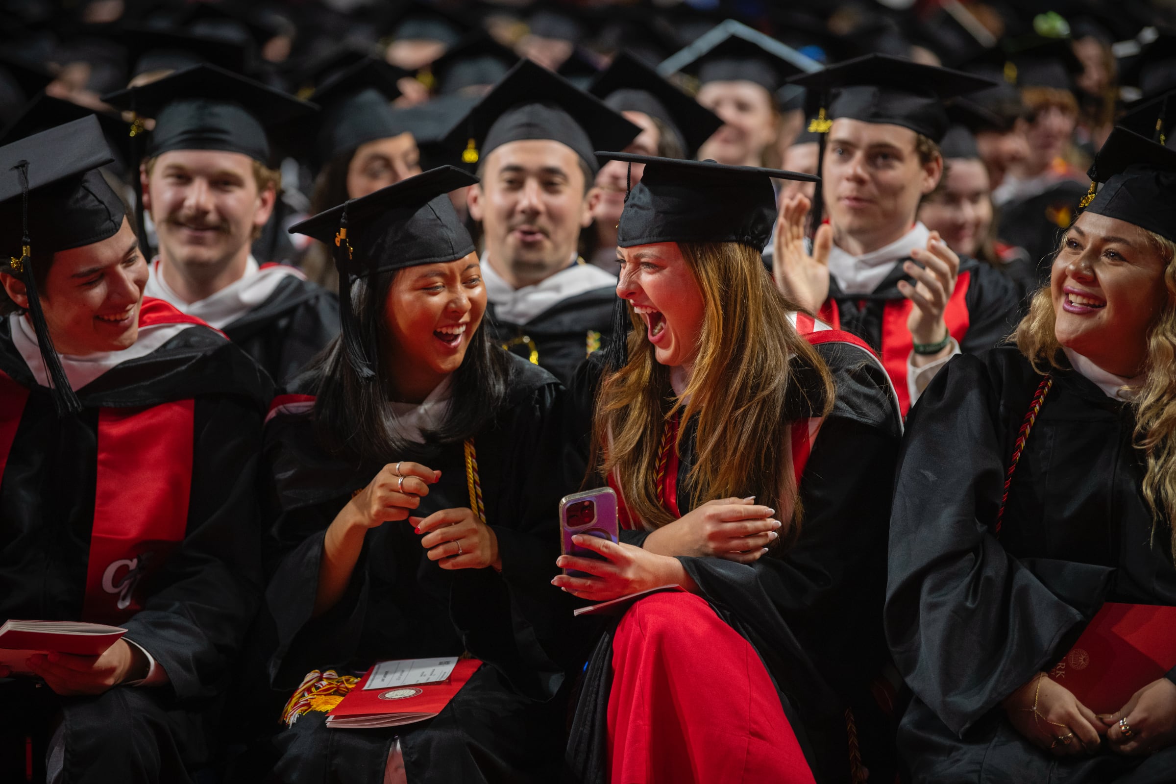 graduates share excitement before the ceremony