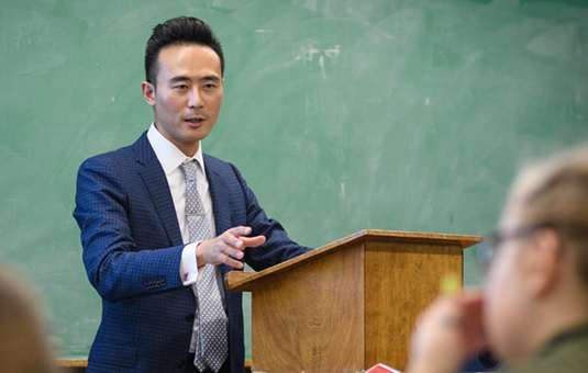 Professor in front of classroom