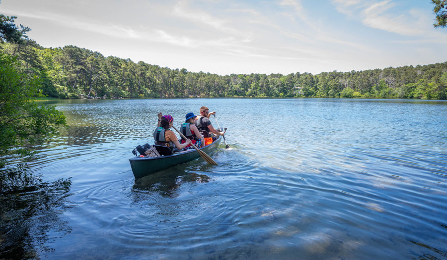 People in canoe in Cape Cod kettle pond