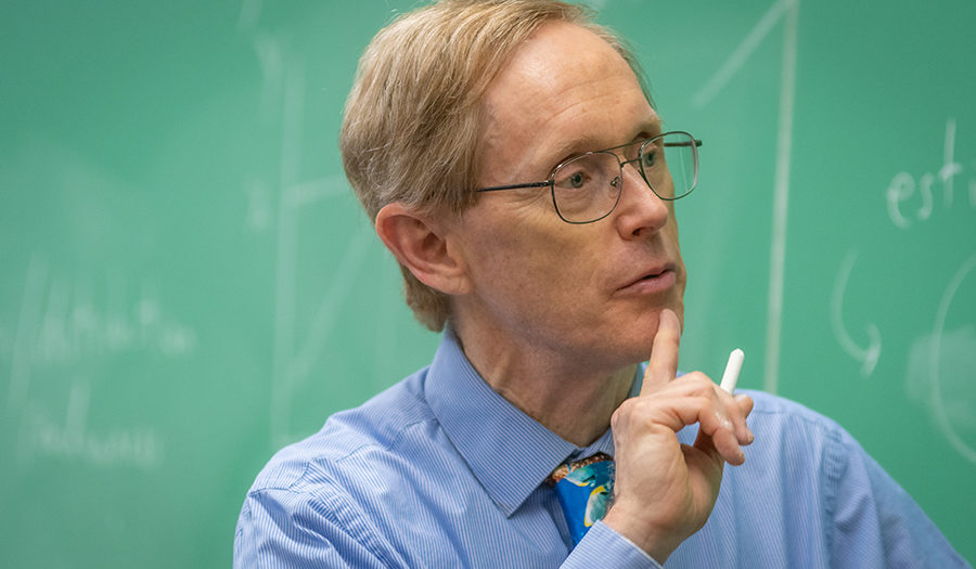 Wayne Gray teaching at the blackboard