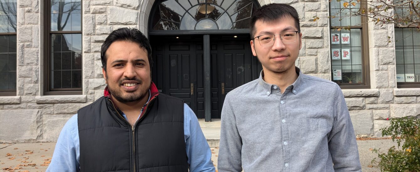 Zeyi and Saleem standing in front of the JC hall.