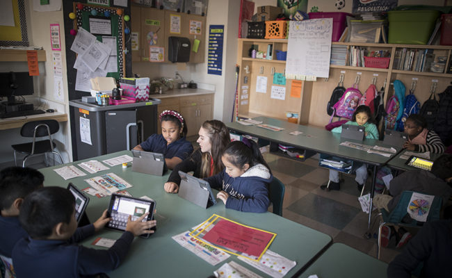 Student teacher in classroom at Claremont Elementary