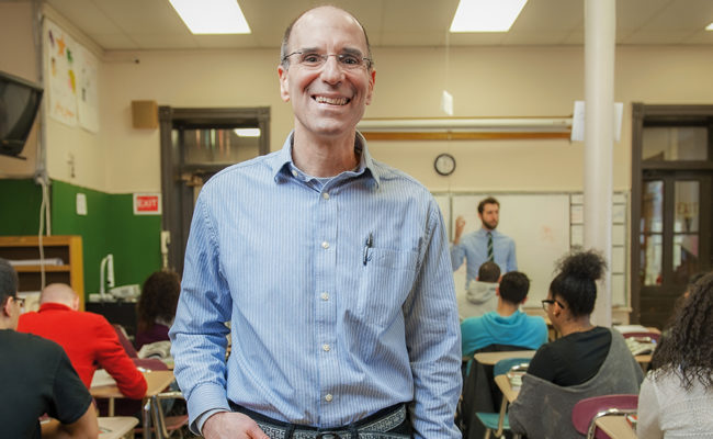 Tom Del Prete in classroom at high school