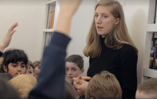 English major Tess Reichart works with children in a classroom