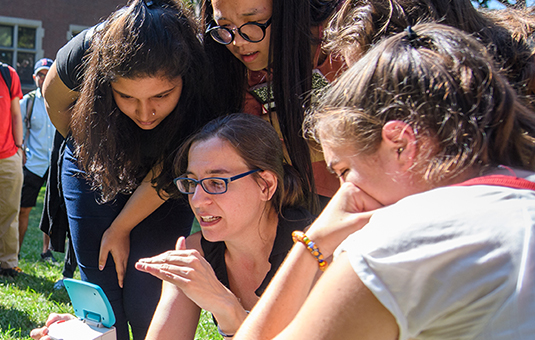 Florencia Sangermano shows students a GIS instrument