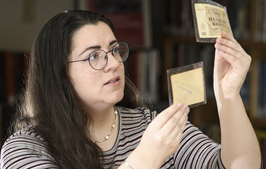Student looking at money