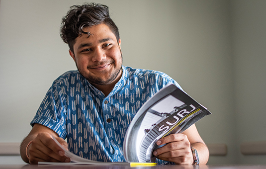 undergraduate philosophy student reading book