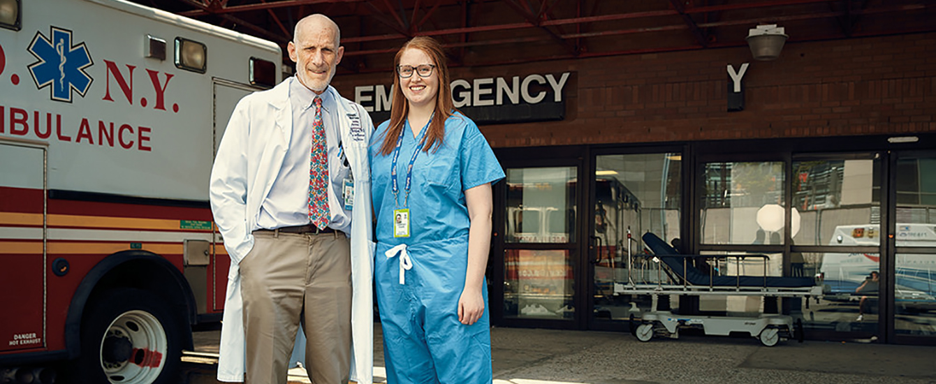 doctor and nurse in front of hospital