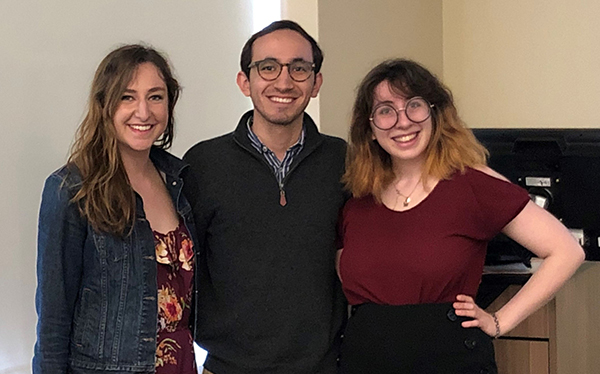 Three students posed