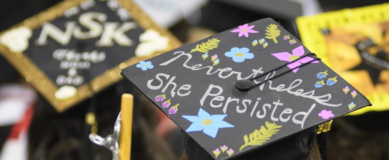 Graduation camp with words "neverless, she persisted"