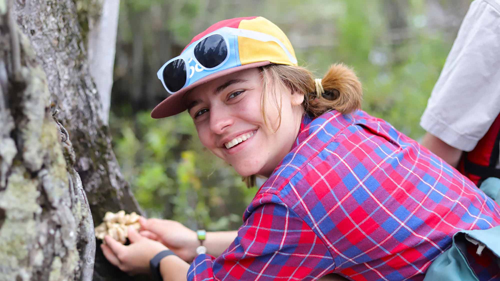 Devon Rose Leaver foraging for mushrooms with David Hibbett's Mycology lab