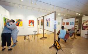 MFA students in the gallery