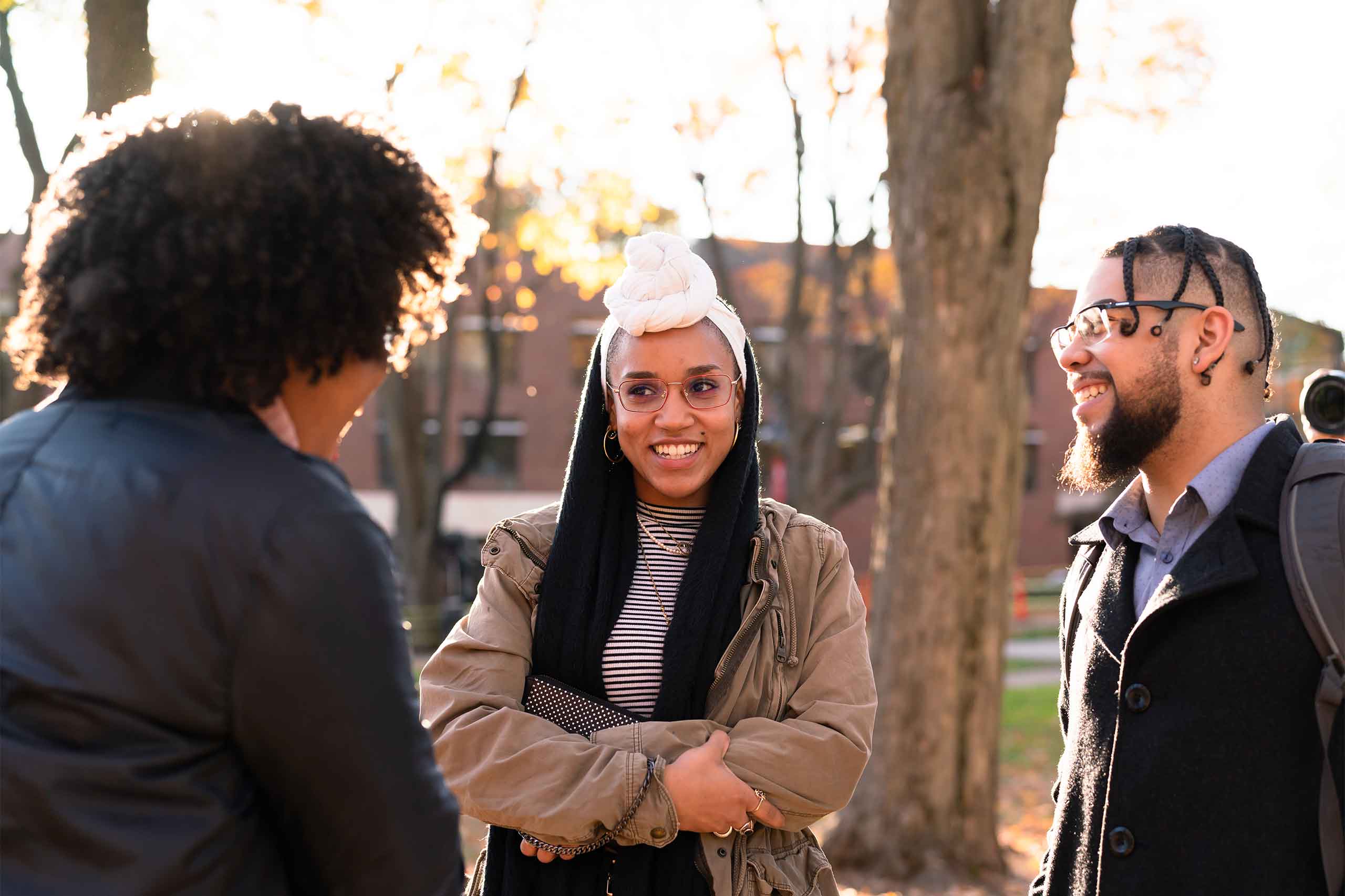 students talking on the green