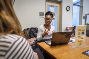 A student works with her adviser in the Academic Advising Center