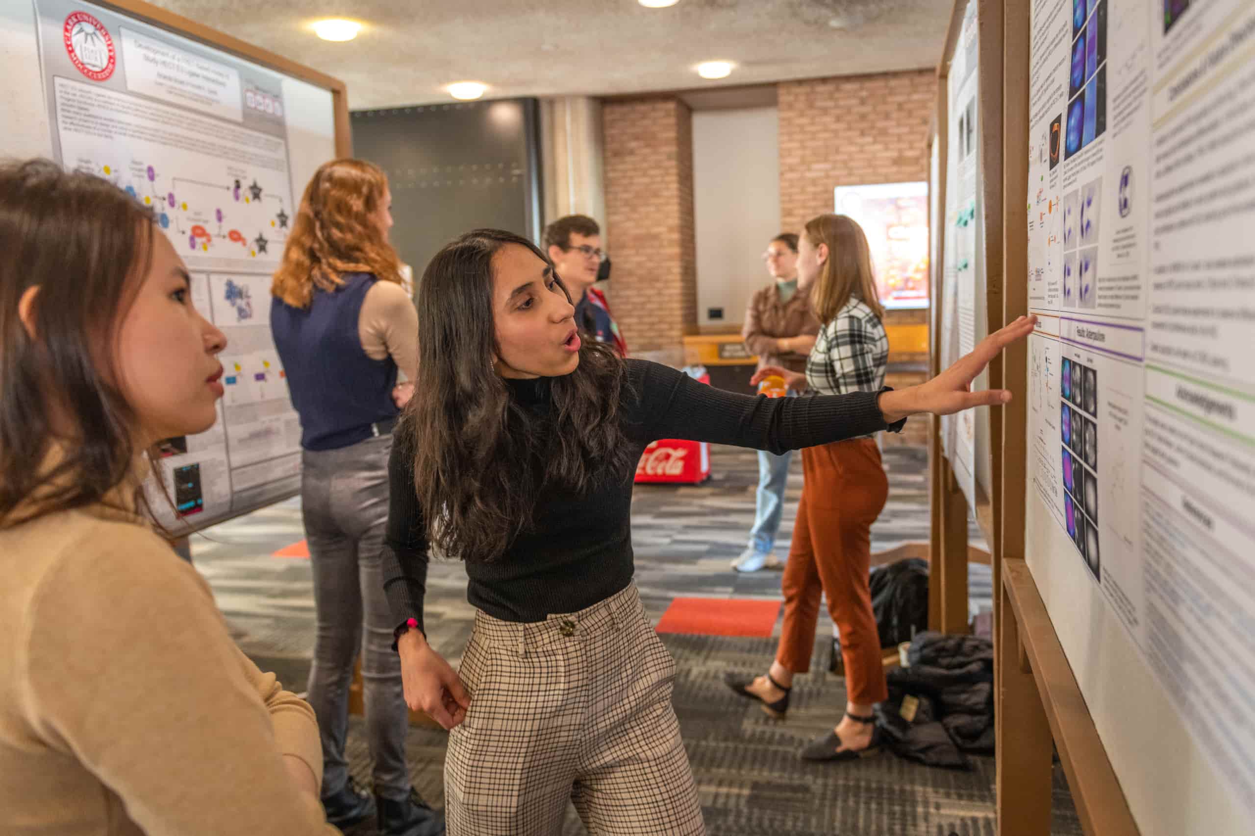 A student presents their work at ClarkFest