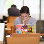 girl sitting in library