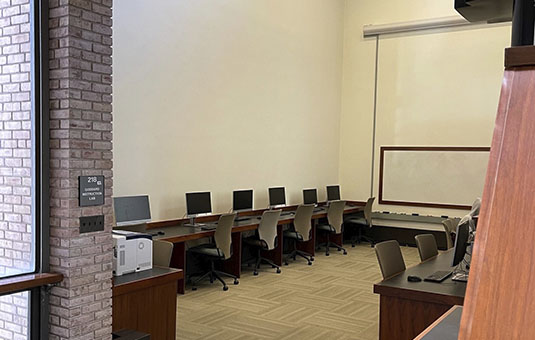multipurpose space with multiple tables and chairs