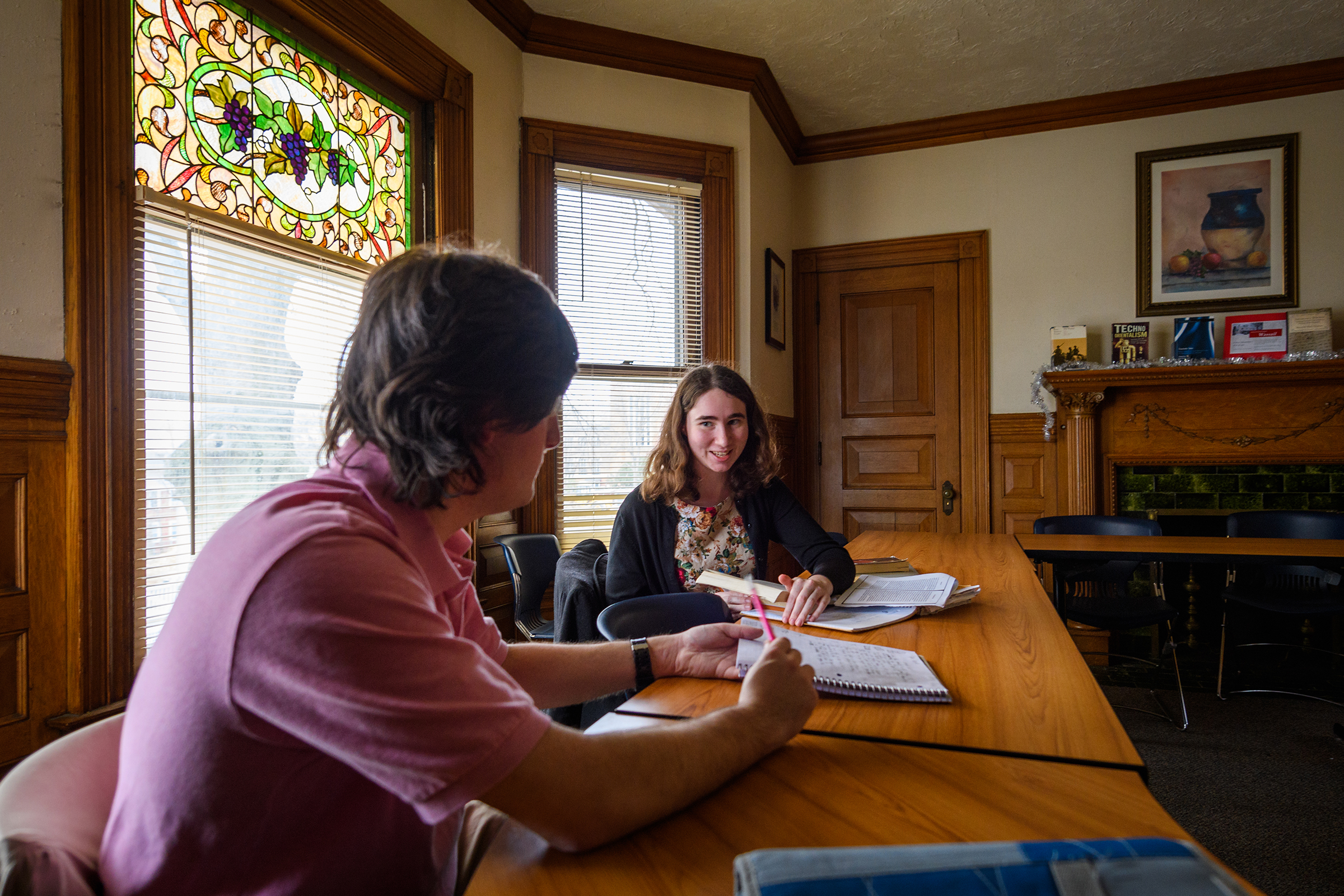 Anderson House with two students sitting in english class