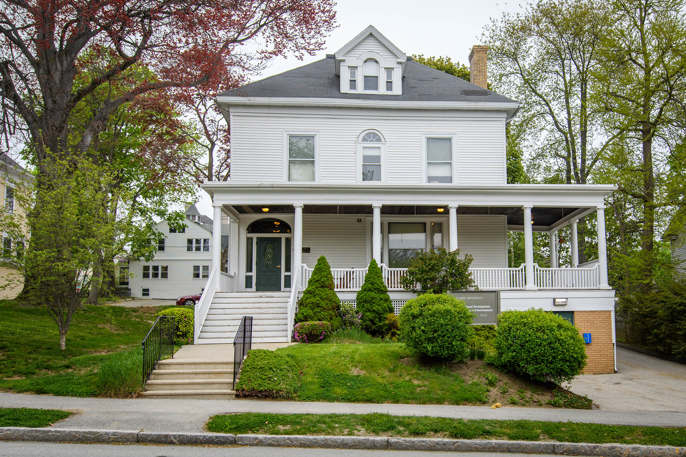 Sustainability and Social Justice House - front porch spring
