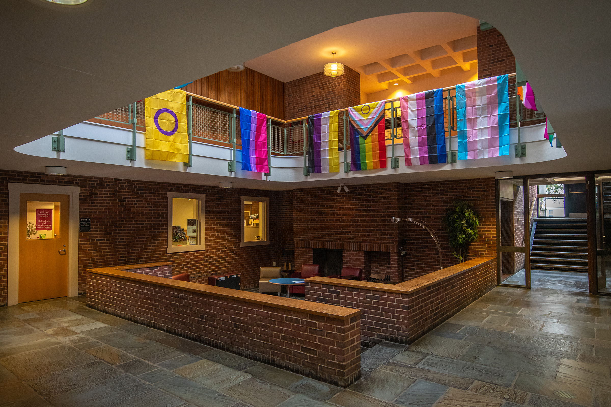 Dana Commons - fireside lounge with flags hanging over