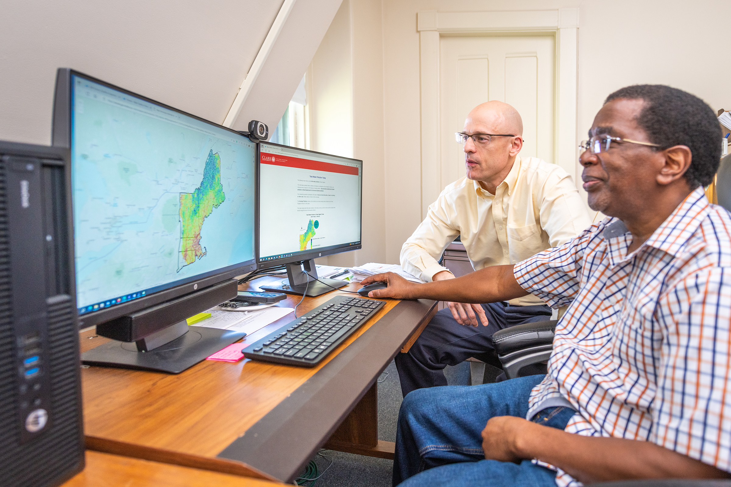 George Perkins Marsh Institute - professors reviewing gis mapping