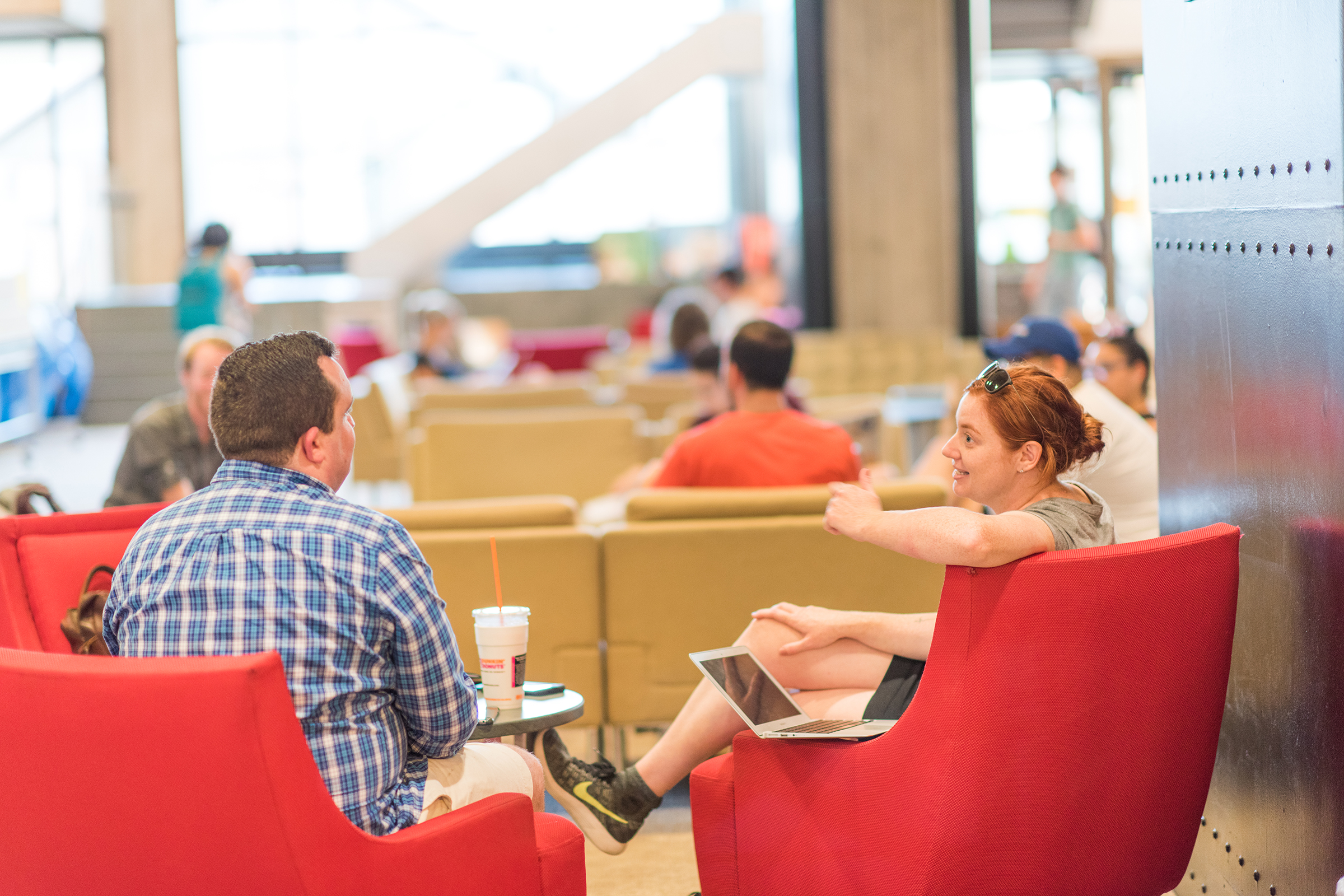 Goddard Library - people in red chairs