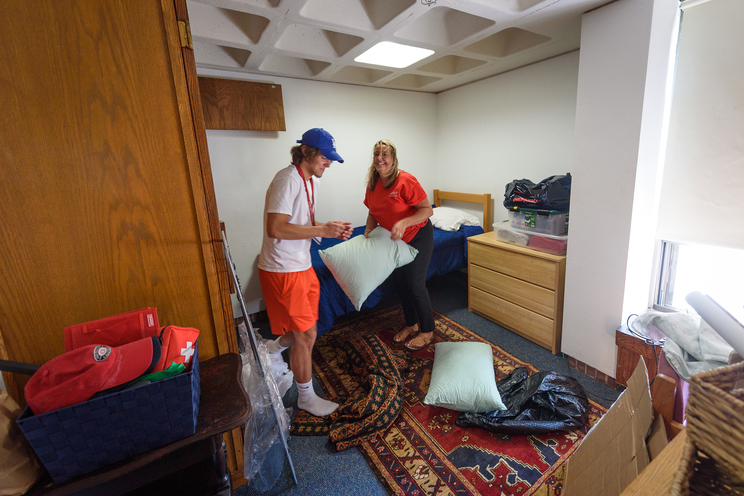 Hughes Hall - mom helping male student move in