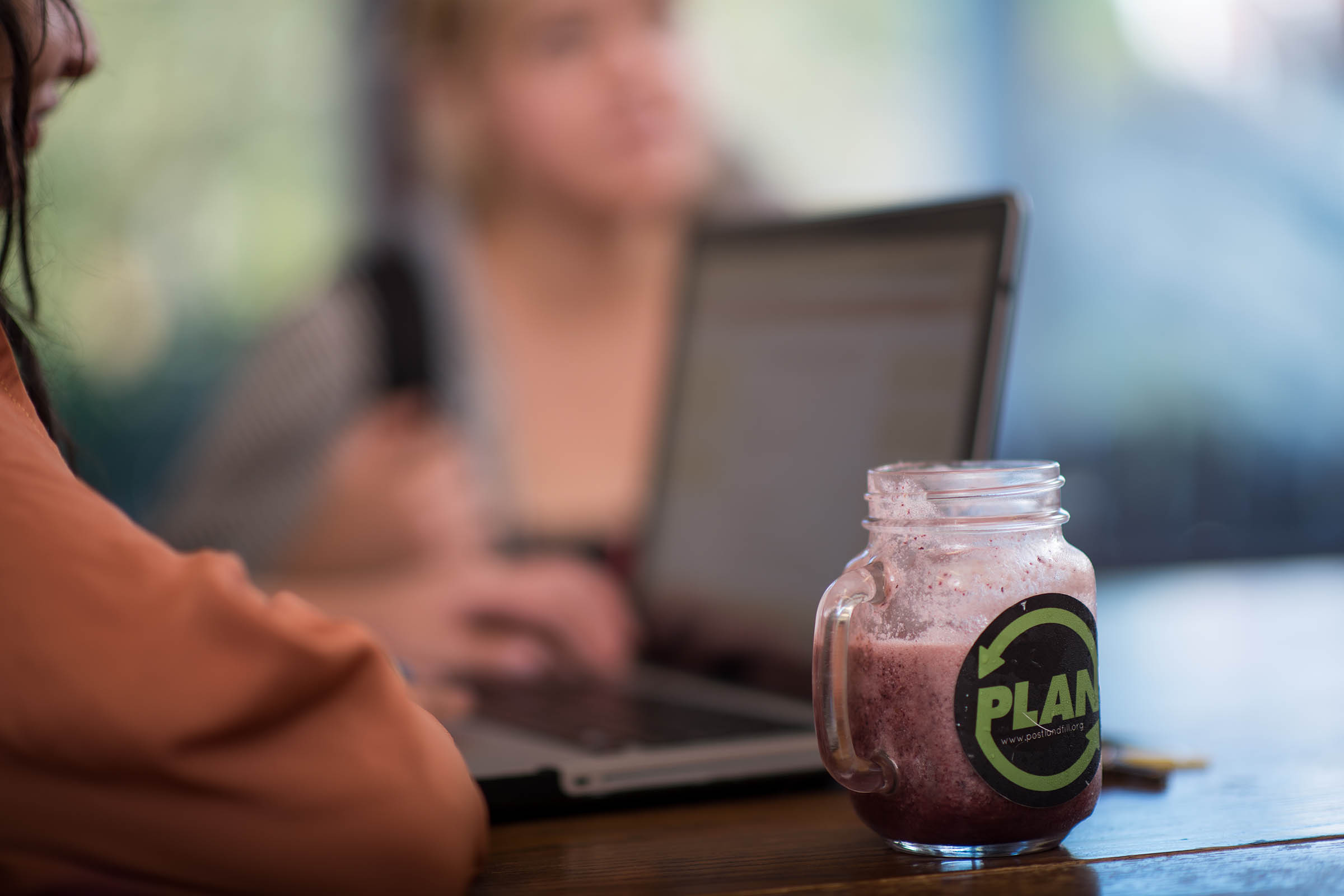Sustainability and Social Justice House - laptop with planet mug
