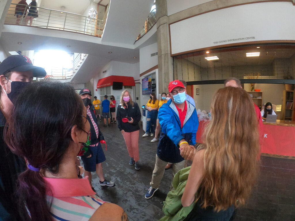 Provost Sebastián Royo greets new students in the Higgins University Center.