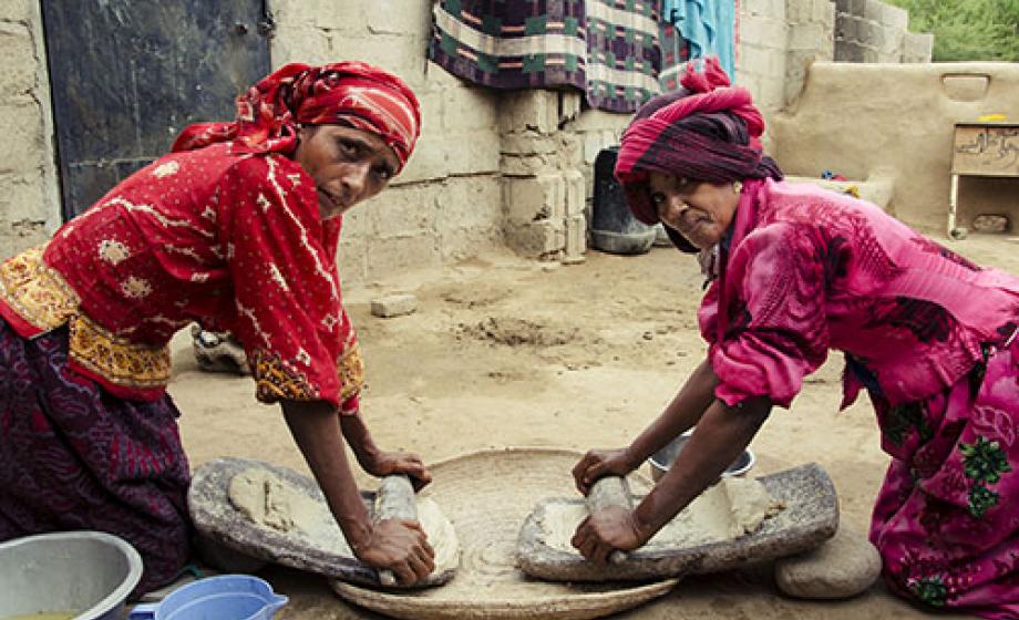 2 women making a product