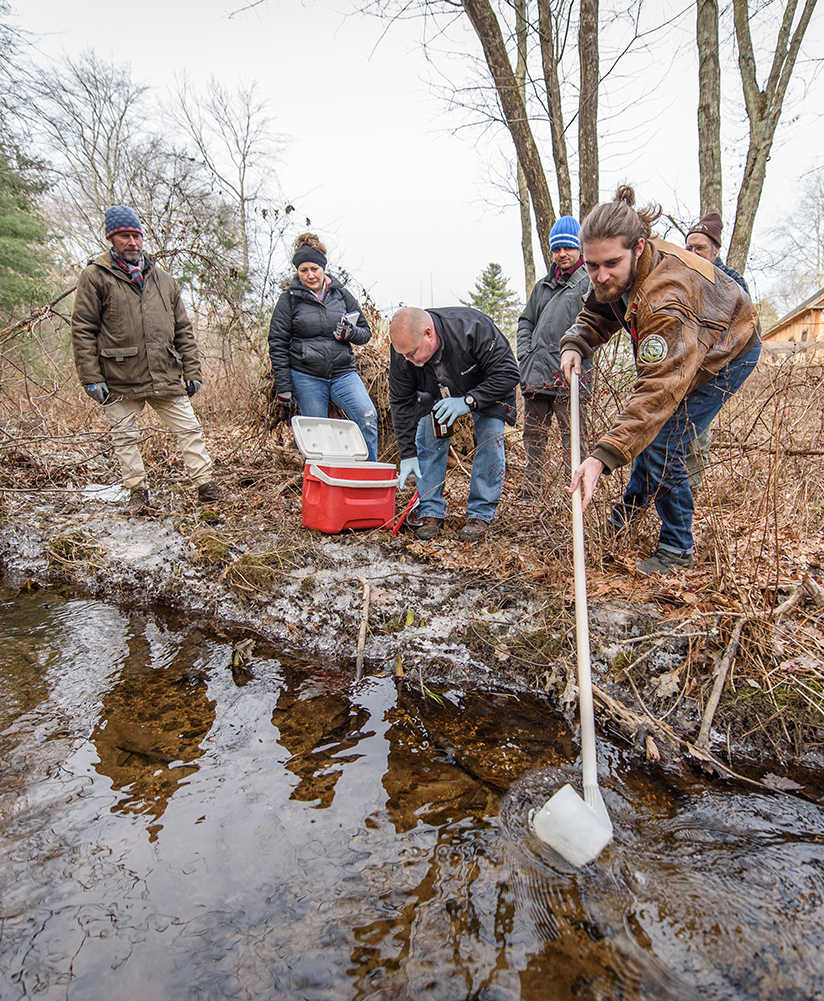 IDCE students take water samples in Uxbridge, Mass.