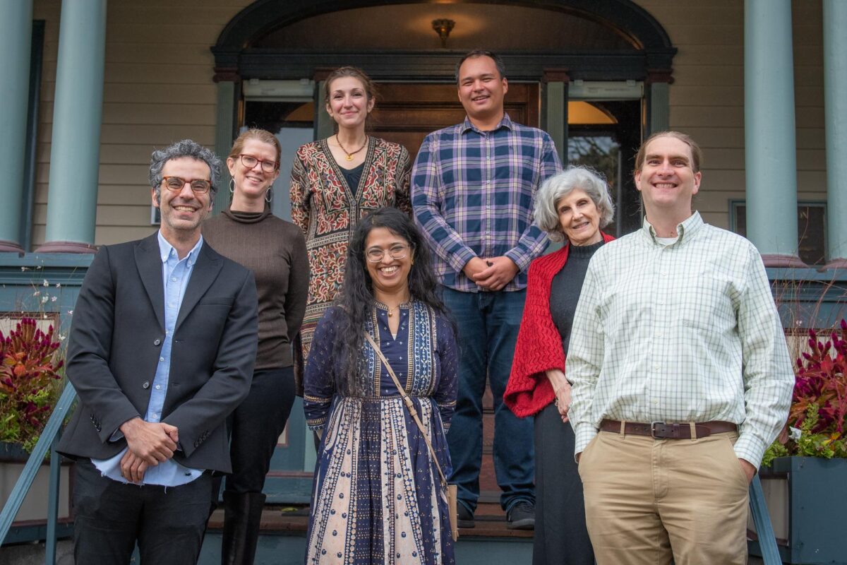 Faculty award winners in front of Harrington House