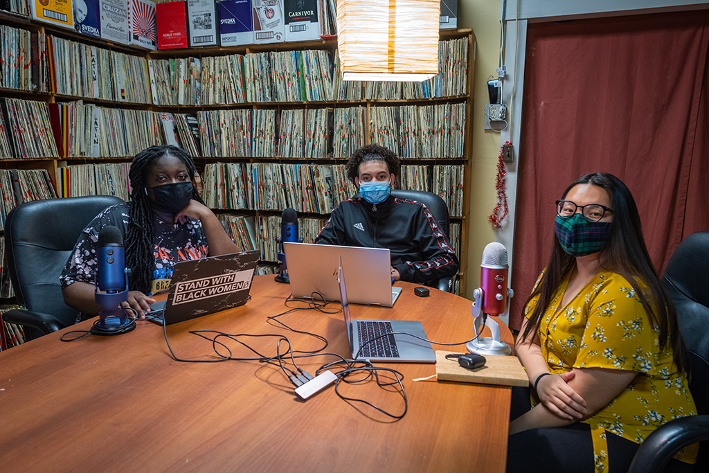 Hiatt Youth Fellows Yaa Brefo, Debrin Adon, and Jennifer Ha, seniors at University Park Campus School, record an episode of their “508Discussions” podcast at WCUW.