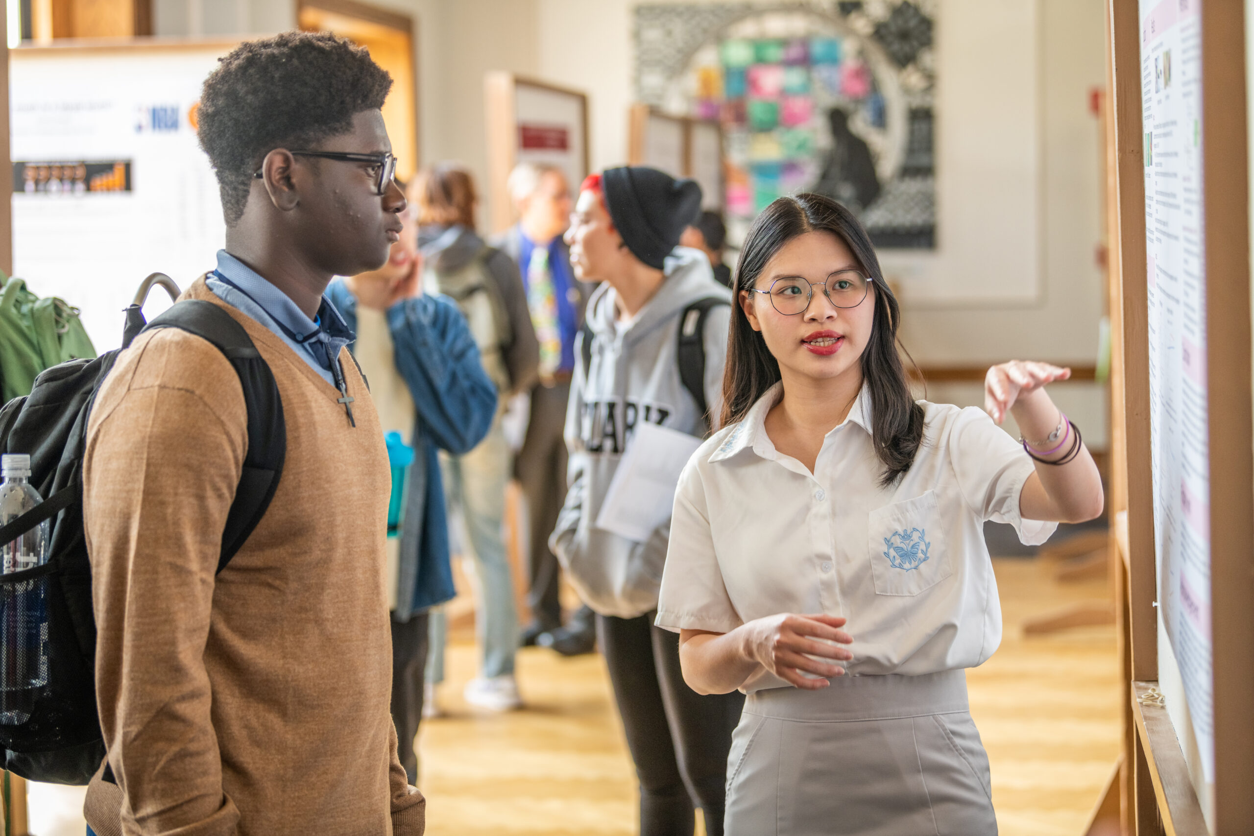 Student presents poster