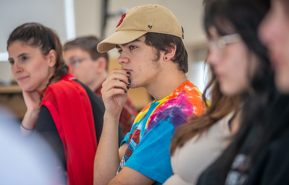 student and faculty in class