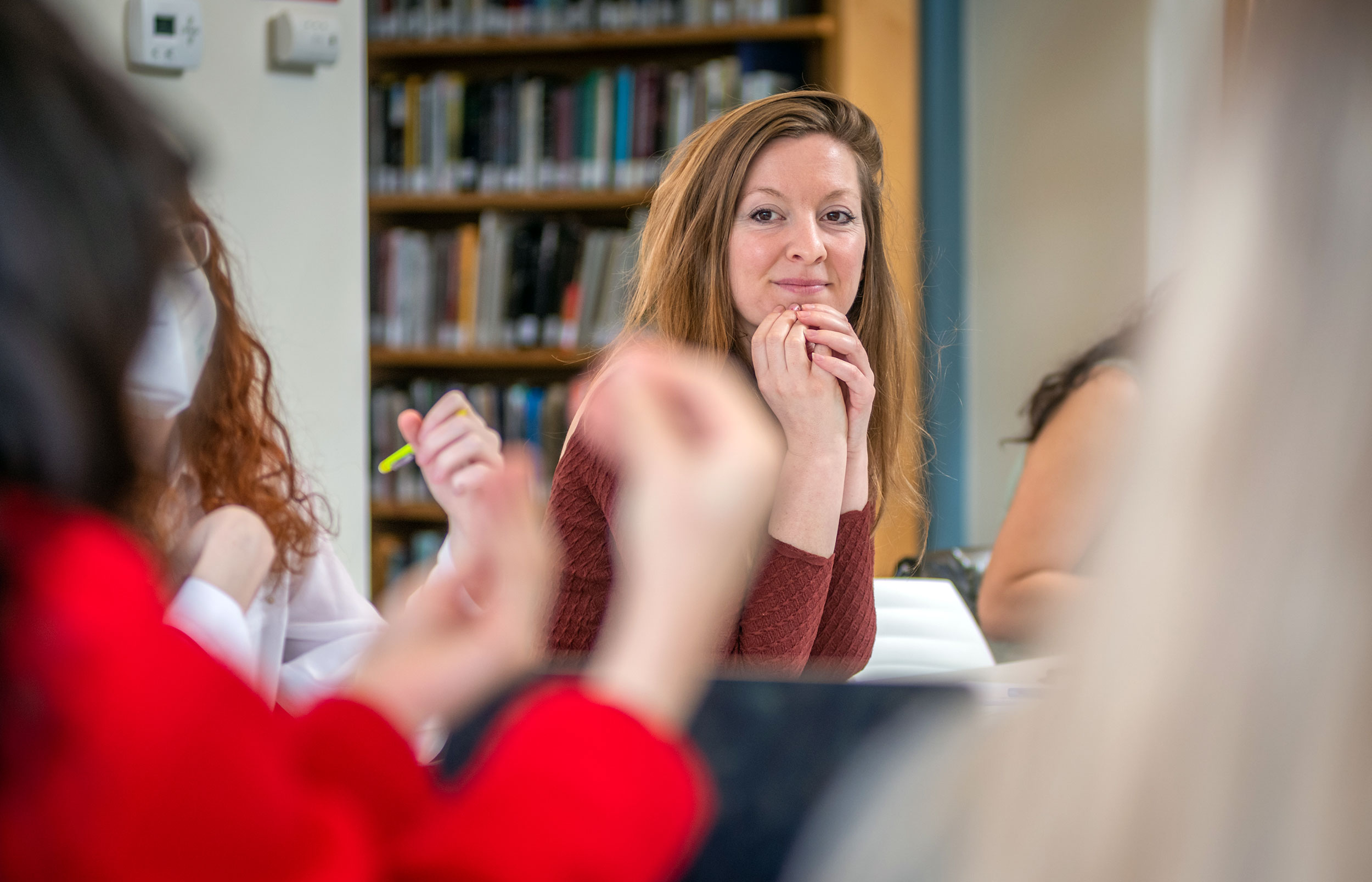 Frances Tanzer smiles in class