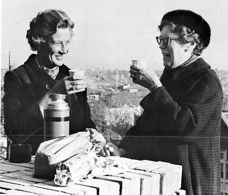 Alice Higgins and Esther Goddard on the roof of Goddard Library