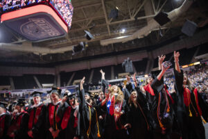 Graduates toss caps at Clark University Commencement