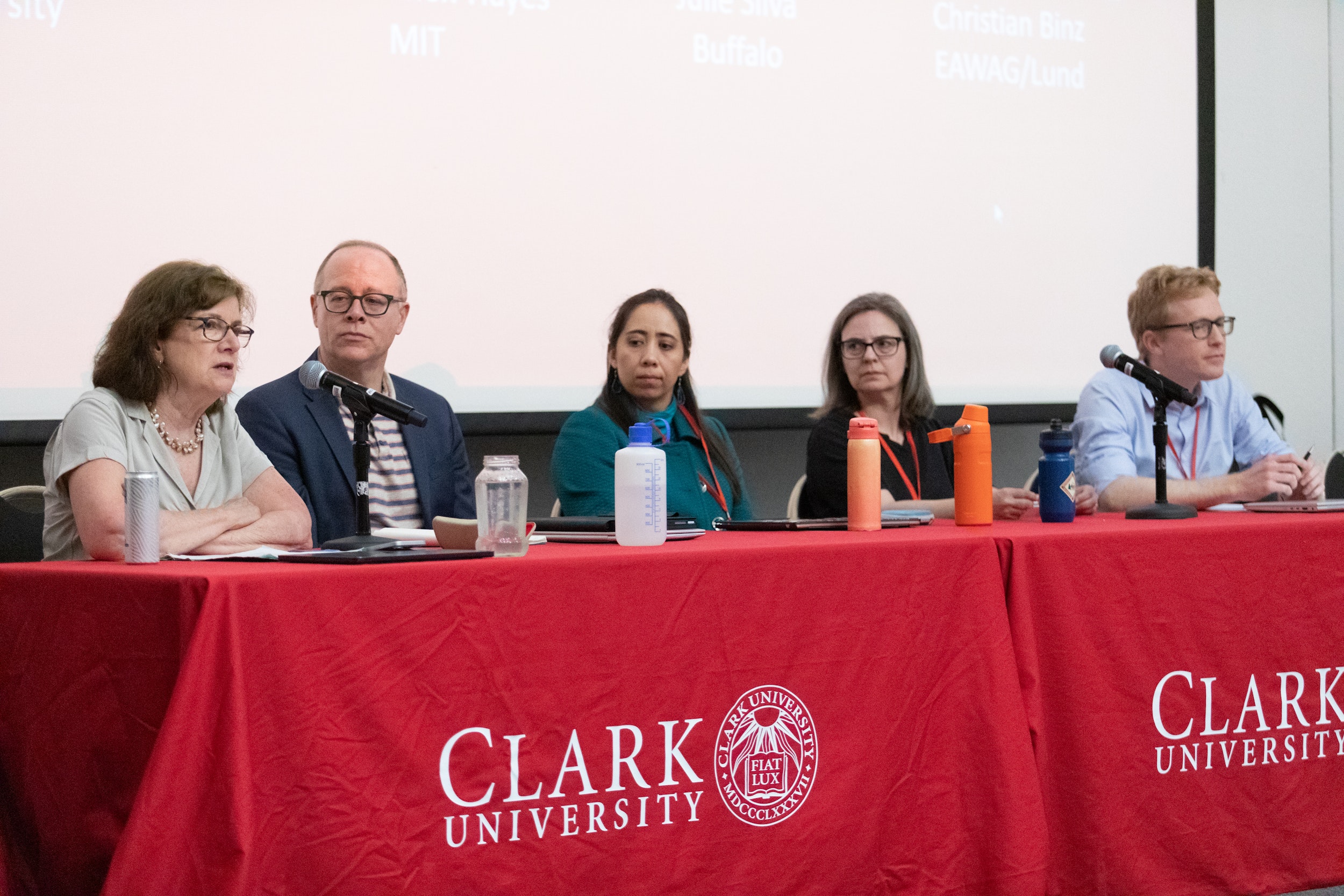 Panelists from left, Joan Fitzgerald, professor of urban and public policy of Northeastern University; Lou Leonard, Clark’s inaugural D.J.A. Spencer Dean of the School of Climate, Environment, and Society; Janelle Knox-Hayes, Lister Brothers Professor of Economic Geography and Planning at MIT; Julie Silva, professor of geography at University of Buffalo; and Christian Binz, a group leader in the cluster of sustainable transitions and business innovations at the Swiss Federal Institute of Aquatic Science and Technology.